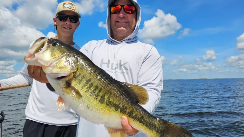 Two anglers holding a trophy largemouth bass on a Clewiston trip with Capt. Mark Shepard